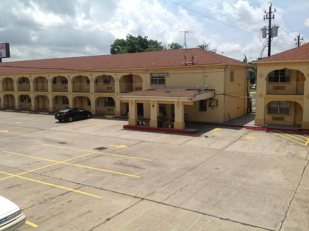 Guest Inn And Suites Хьюстон Экстерьер фото