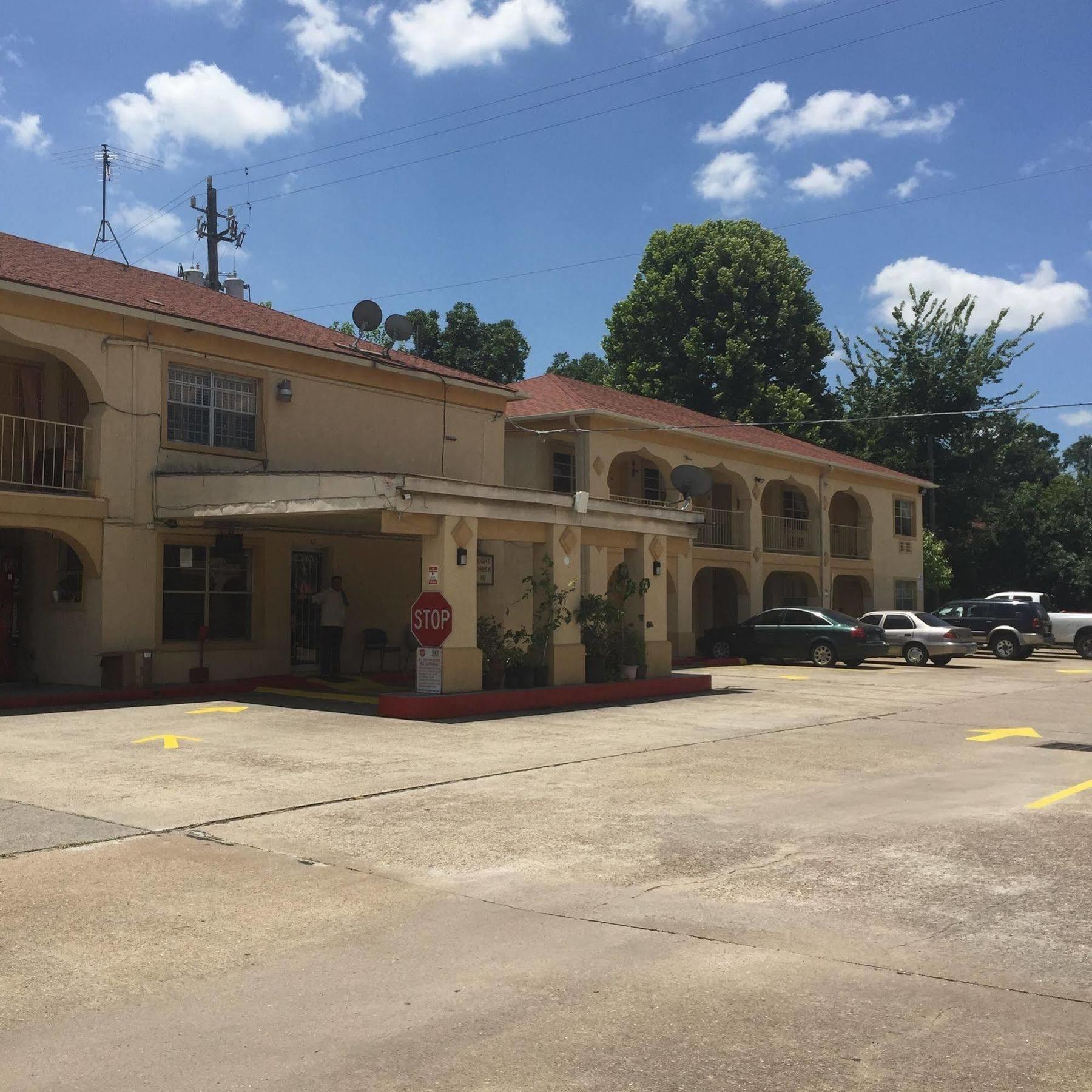 Guest Inn And Suites Хьюстон Экстерьер фото