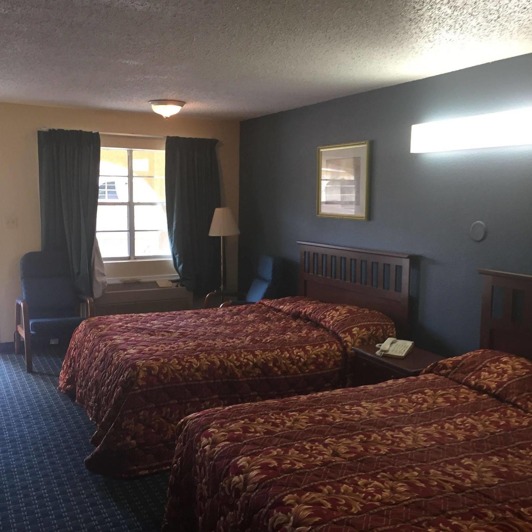 Guest Inn And Suites Хьюстон Экстерьер фото