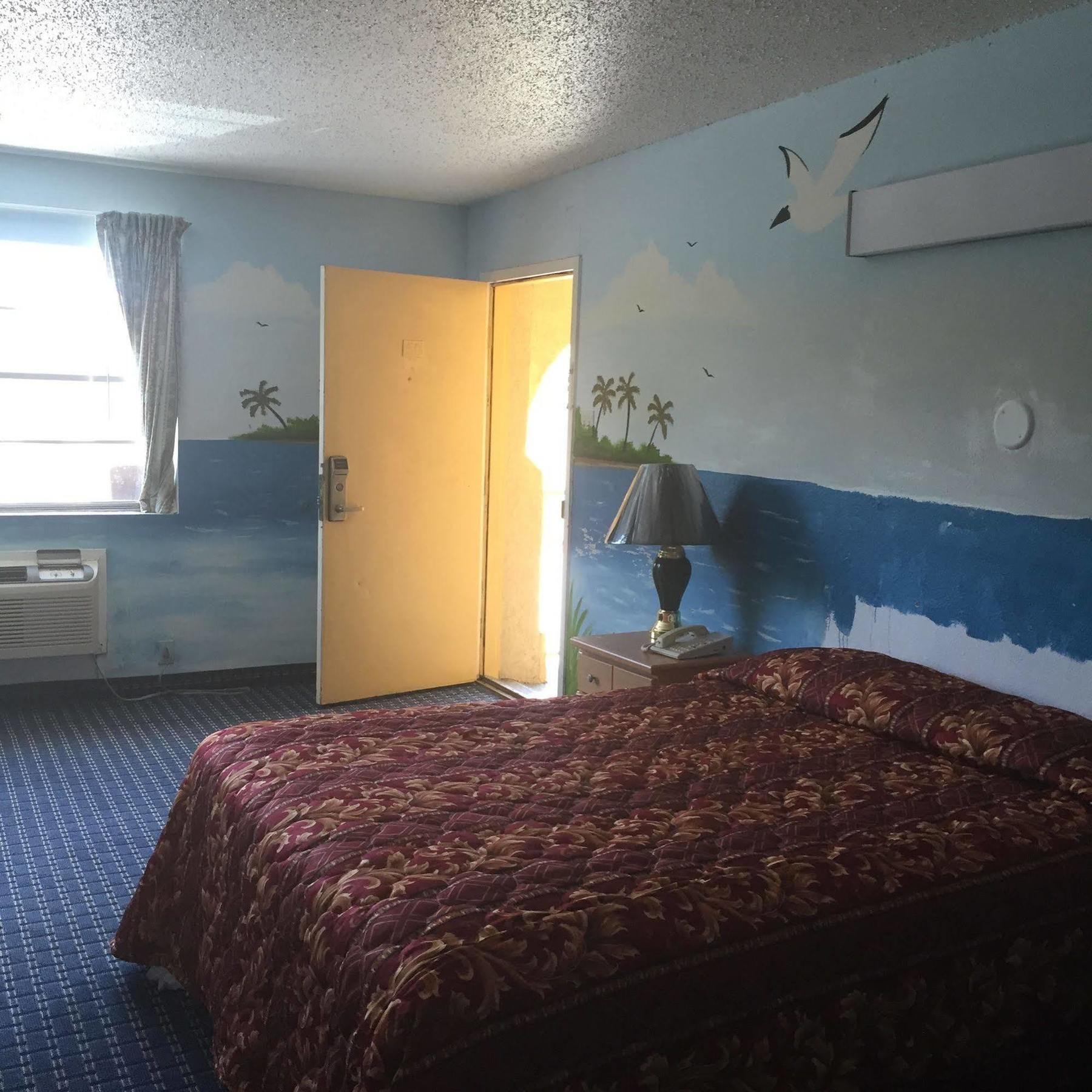 Guest Inn And Suites Хьюстон Экстерьер фото